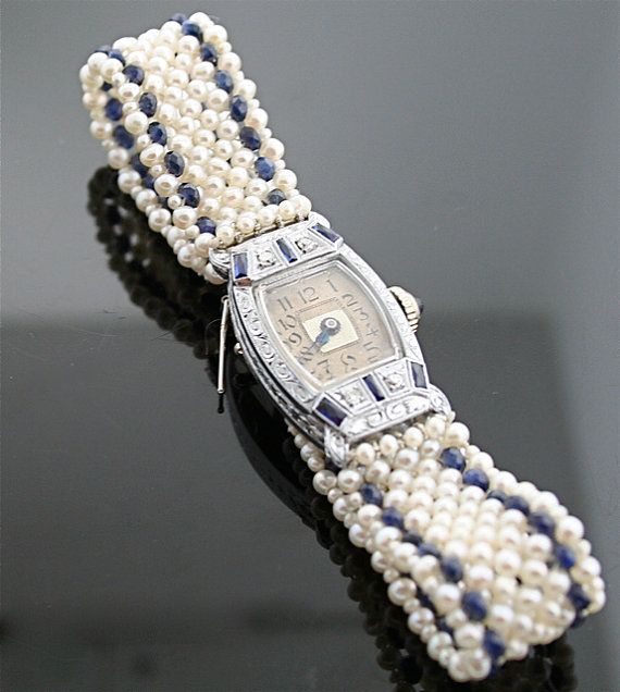 mavi ve beyaz incili modern bayan saat tasarımı